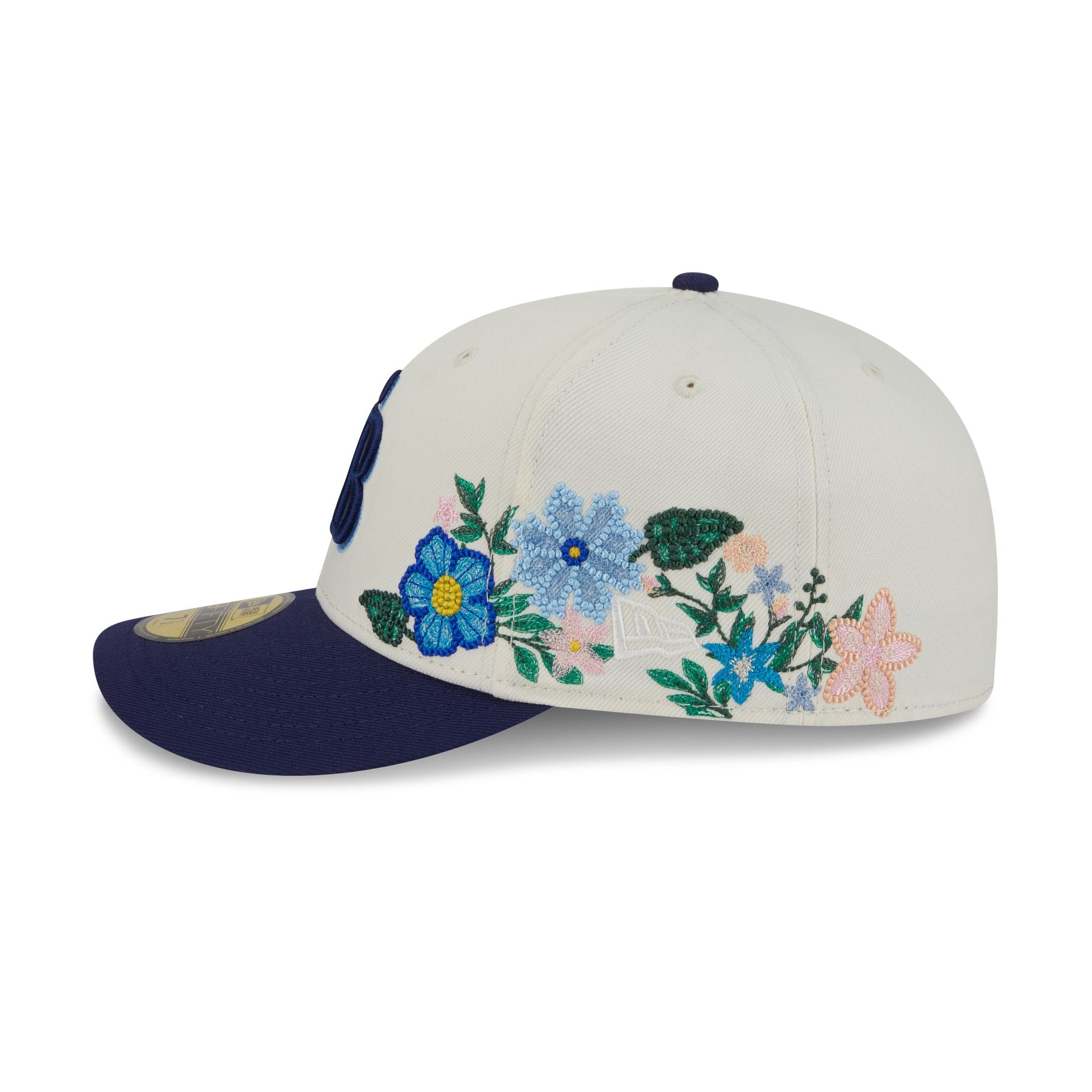 60668977_59FIFTY_TONALFLORALS25426_TAMRAY_OTC_LSIDE-1.jpg