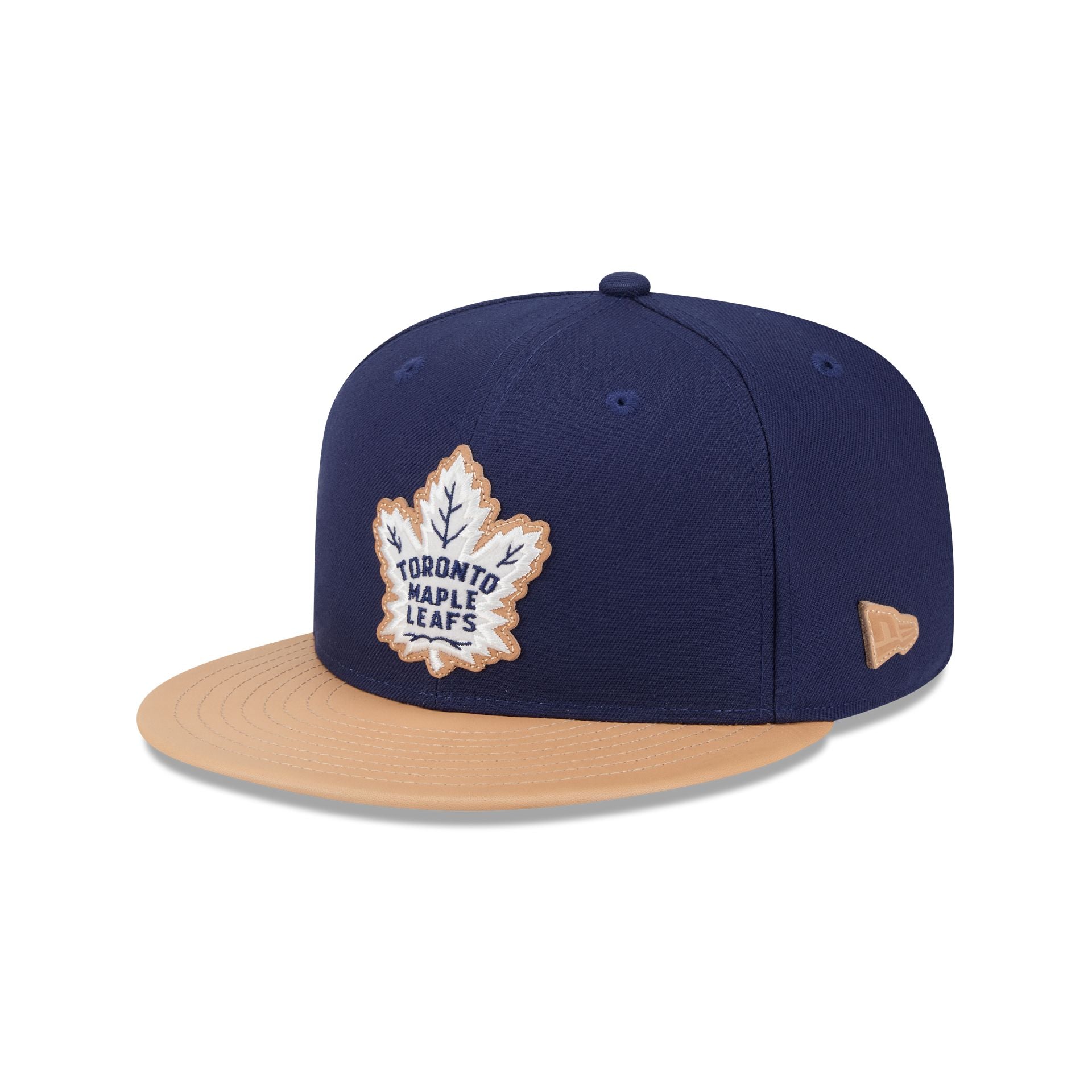 60696290_59FIFTY_5950LEATHER25990_TORLEA_OTC_3QL.jpg